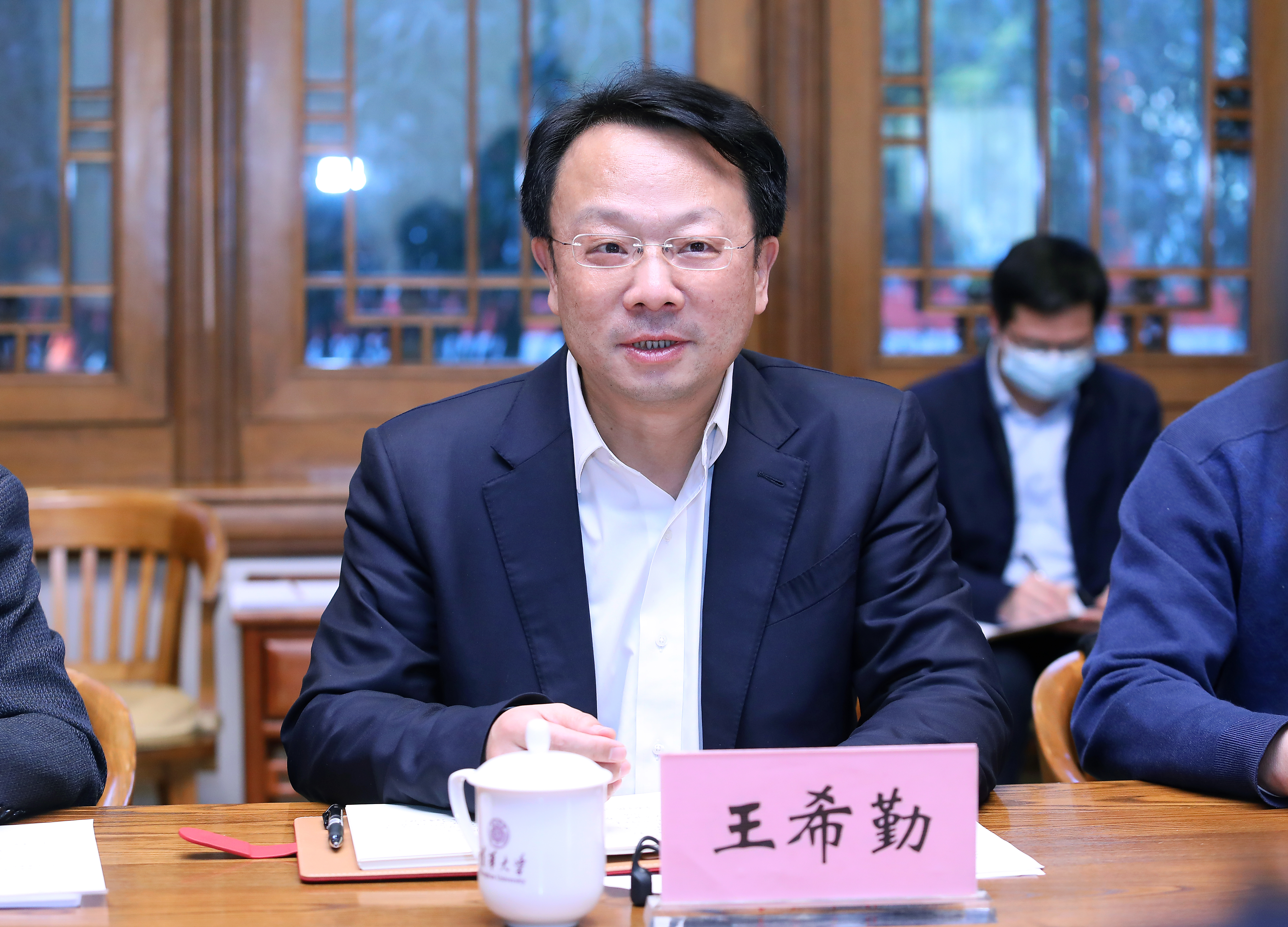 20220301-火博在线与中医药管理局签署合作框架协议-许刚-王希勤定版.jpg